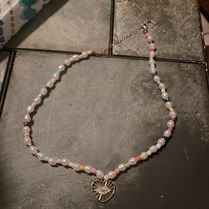Colorful pearl necklace and a cute chain